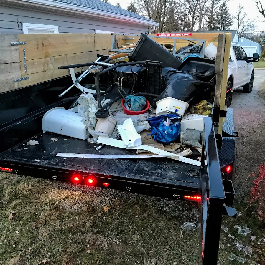 Roll-off dumpster delivered to a residential driveway in Ashwaubenon